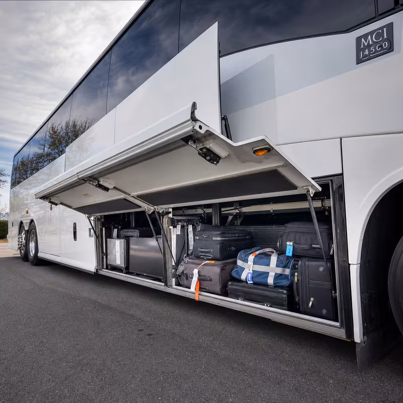 Party bus interior with wraparound leather seating and LED lighting in St. Petersburg