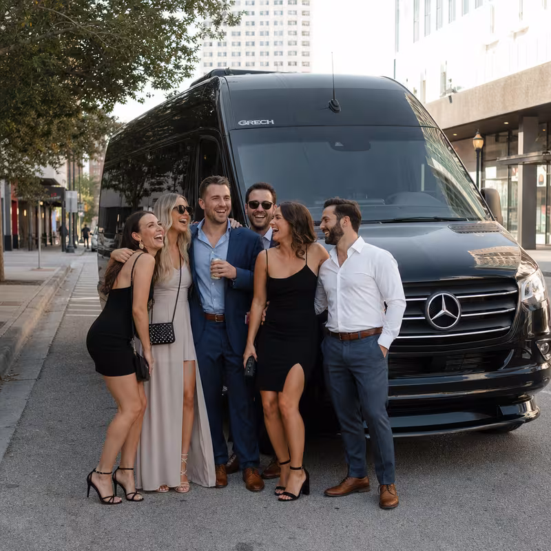 Group boarding a white charter bus for Bachelor & Bachelorette Transportation transportation in St. Petersburg