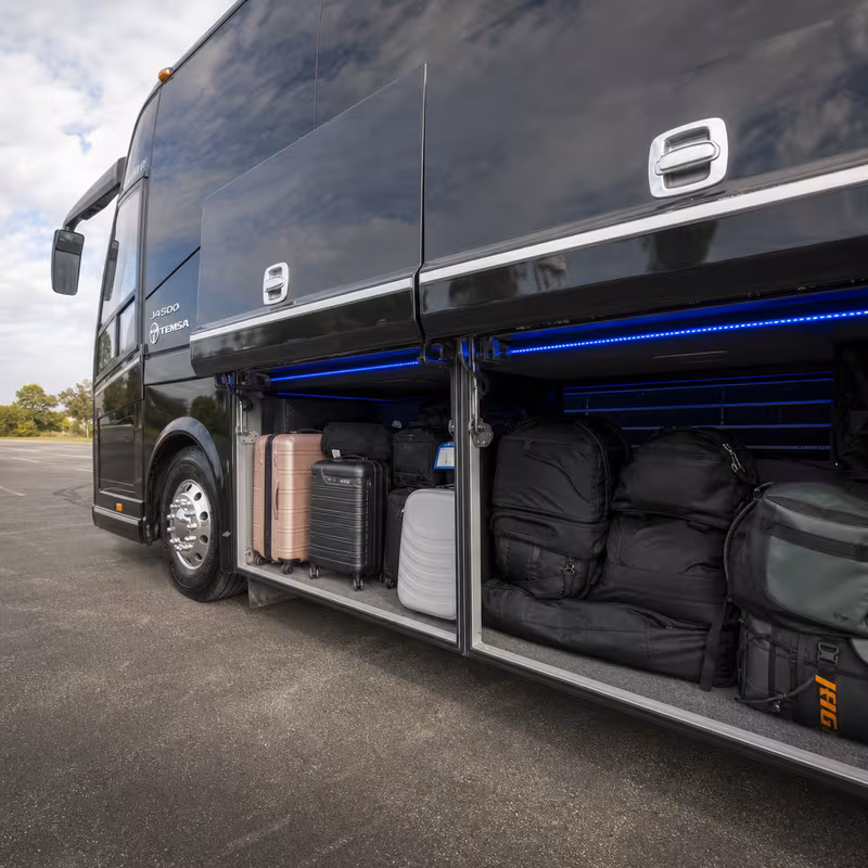 Party bus interior with wraparound leather seating and LED lighting in St. Petersburg